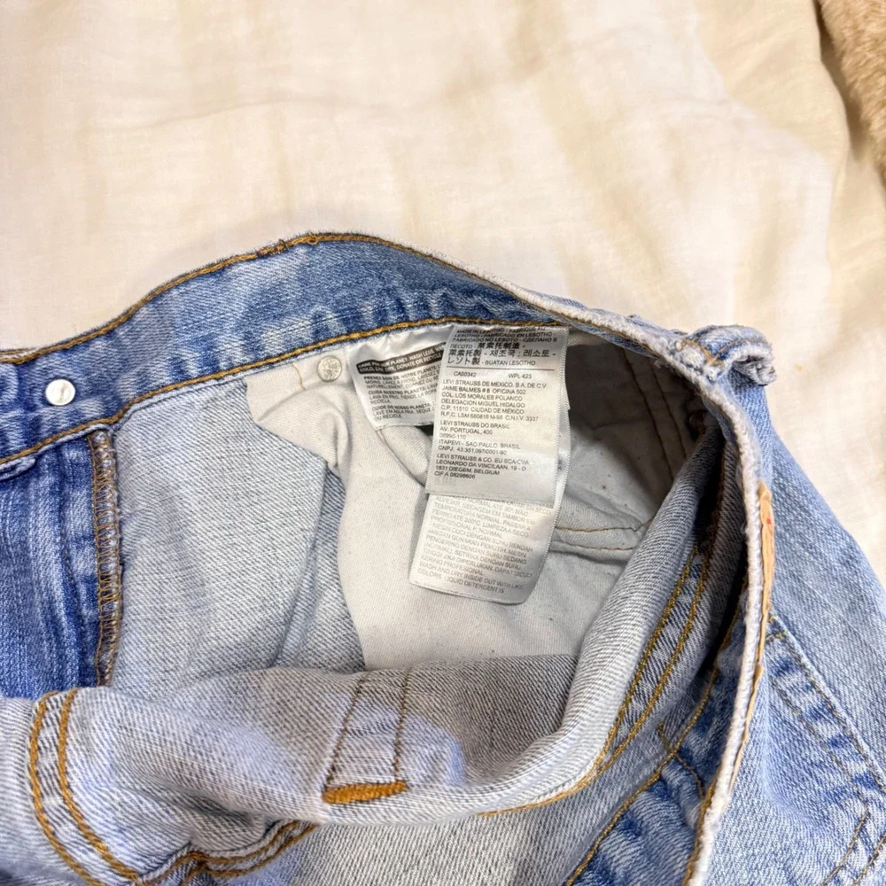 Levis 569 Loose Straight Leg Jeans Mens 34x30 Light Wash Blue Denim 00569-0110